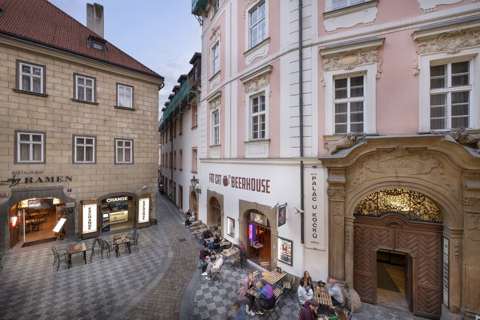 Historic Prague lane with cafés outside the residence in Old Town