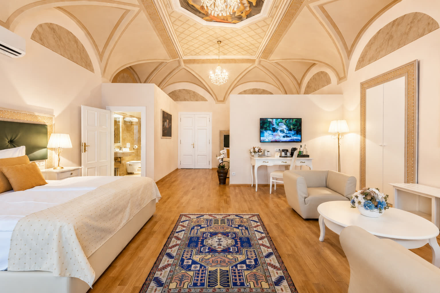 Spacious historic suite with painted vaulted ceiling