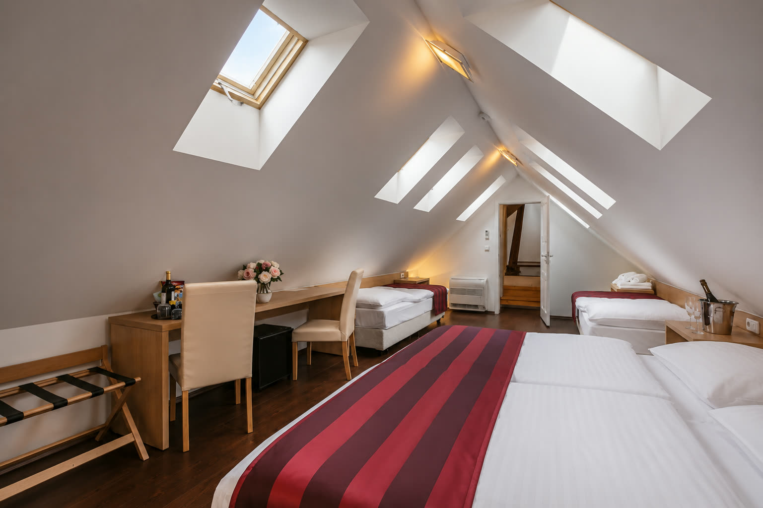 Attic family room with skylights at U Malvaze